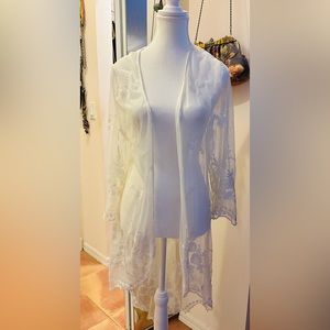 Woman’s white lace cover camisole top
